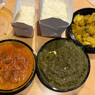 Our pickup order, Butter chicken, Palak paneer (spinach cheese), Aloo gobi