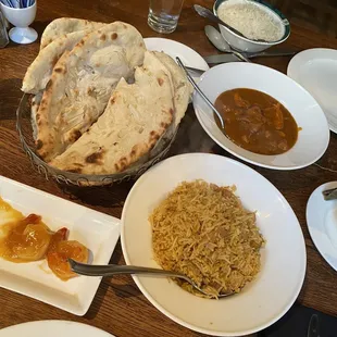 Butter Chicken Makhani, Chicken Biryani, Mango Shrimp, and Naan