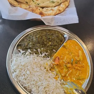 Lunch combo saag paneer and veg korma with garlic naan