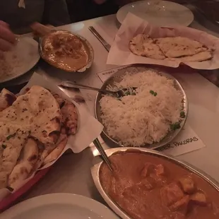 a table full of indian food