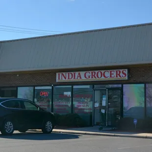 a car parked in front of the store