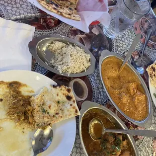 Chicken tikka masala, chicken curry, rice and garlic naan. We also had the samosas, which were delicious!