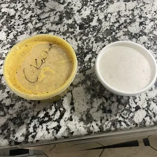 a bowl of soup and a bowl of yogurt