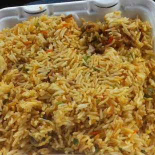 Chicken biryani and rice...the meat is under the rice...I could dig it