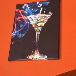 a glass of martini