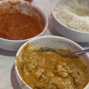 CHICKEN KORMA (front) and BUTTER CHICKEN (back) both delicious and come with your own rice bowl.