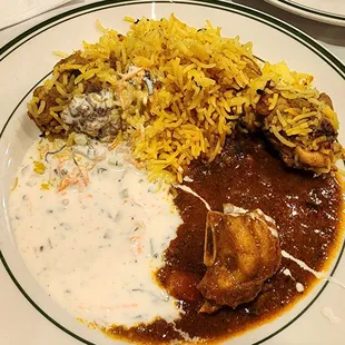 Buffet Round # 4. Freshly arrived chicken biriyani, raita and goat curry.