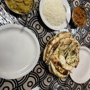 2. Chicken Sahi Karma and 10. Lamb Tikka Masala with Bread basket that includes Cheese Naan, Garlic Naan, and Plain Naan