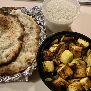 Keema Naan - naan flatbread stuffed with meat, and tandoori chicken tikka with fluffy, delicious basmati rice.
