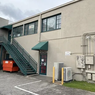 the outside of a building with stairs