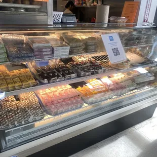 Pastries, edibles at bake station in front.