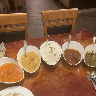 Left to right, Butter chicken, Curry chicken, Basmati rice, lamb vindaloo, and paneer saagwala. Also had some amazing garlic naan.