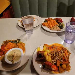 three plates of food on a table