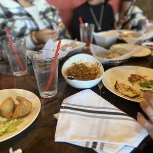a group of people eating at a restaurant