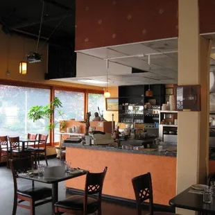 the kitchen and dining area of a restaurant