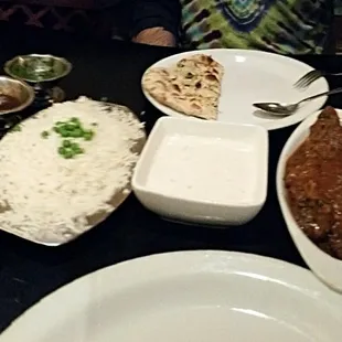 The goat curry (bone-in) and the mixed vegetables: Our absolute favorites!