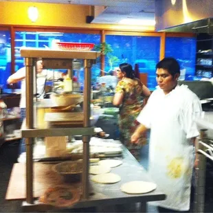 Kitchen Action Photo- Mom/Owner does most of the cooking!