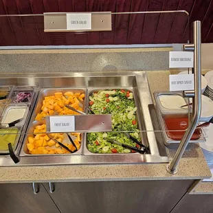 1  As you enter the buffet is set up in a U shape the salad and some sauces start the line on the right