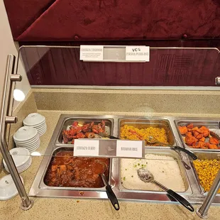 4 the left side of the back .  Zoom in to see the dish names lower glass and the top of the glass.