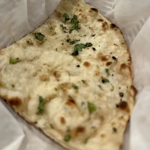 Last piece of Garlic Naan! Who's going to get it...