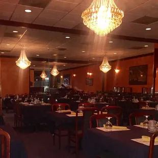 dining room with chandeliers and chandeliers