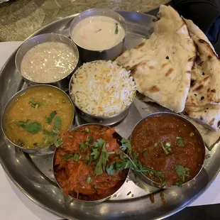 Non-vegetarian complete dinner- includes butter chicken, lamb currry, dal, basmati rice, naan,raita and a dessert for $18.95