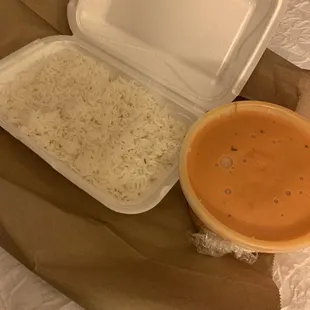 Takeout - chicken tikka masala; one container of rice and one of the chicken/sauce