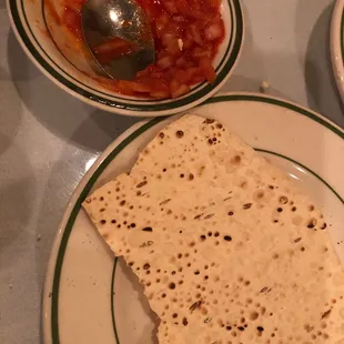 Complimentary flat bread and spiced onions
