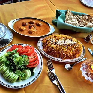 Malia kofta, chicken biryani, mix green salad, and Garlic Naan