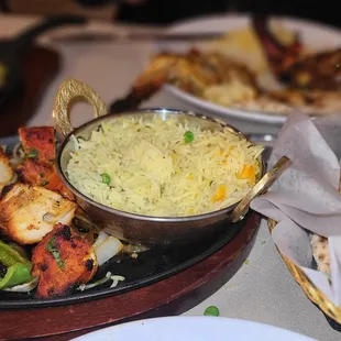 Tandoori Chicken, Chicken Tikka Kebab, rice pilaf and Naan bread