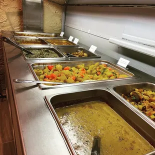 a variety of food items in a buffet