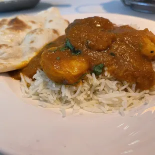 Shrimp curry with rice and naan