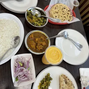 Chicken curry, bhindi, tawa roti, lassi