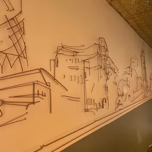 a drawing on the wall of a restaurant