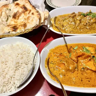 Chicken Tikka Masala (front) and Chicken Korma (next to garlic/butter naan bread)