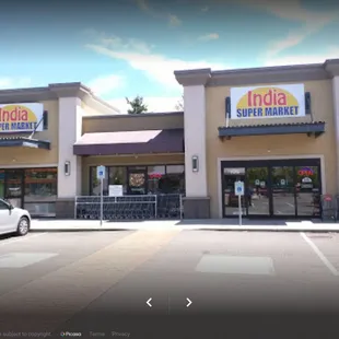 a car parked in front of the store