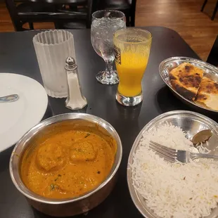 Malai Kofta, Basmati, Butter Naan, and Mango Lassi.