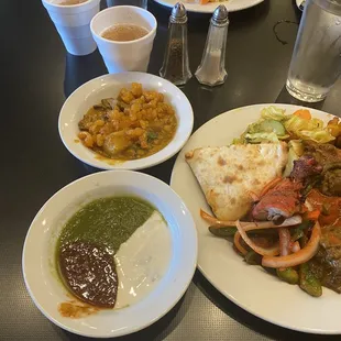 Indian Buffet: chicken currey, tikka masala, tandoori chicken, cabbaze broccoli, Dal Makhani, nan and sauces.