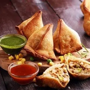 Crispy fried Samosa's stuffed with potato and peas.