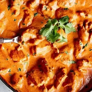 A creamy tomato sauce with a blend of Indian spices, our Butter Chicken is the most popular dish at Indian Bistro!