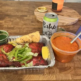 a tray of food and a drink