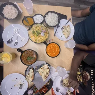 Garlic Naan, Butter Masala, Chicken Biryani, and chicken 555.