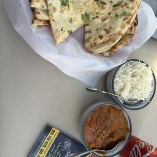 Butter chicken , rice , garlic naan