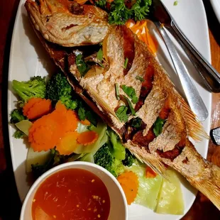 My favorite dish fried red snapper with chili lime sauce! It is addictive, fresh, crunchy, and delicious! It is served with white rice.