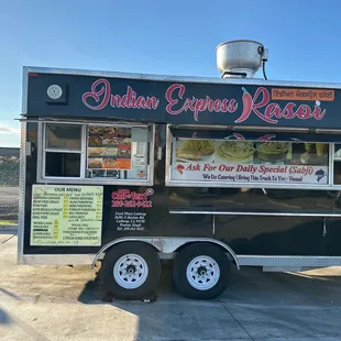a food truck parked in a parking lot