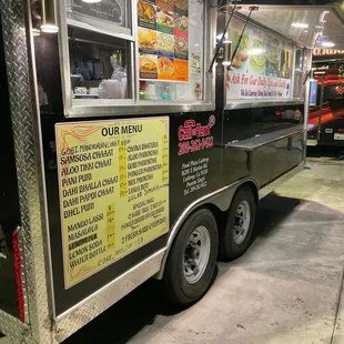 a food truck with menus