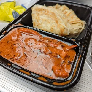 Butter chicken with paratha- very good, not spicy.