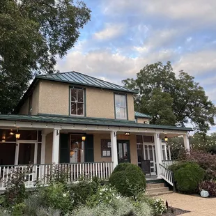 Exterior of restaurant.  Outdoor seating is out of view around the right side.