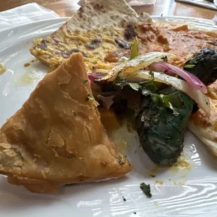 A samosa and some tandoori chicken