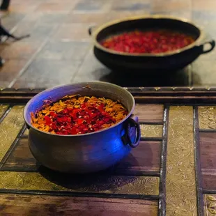 a pot of chili and a bowl of chili